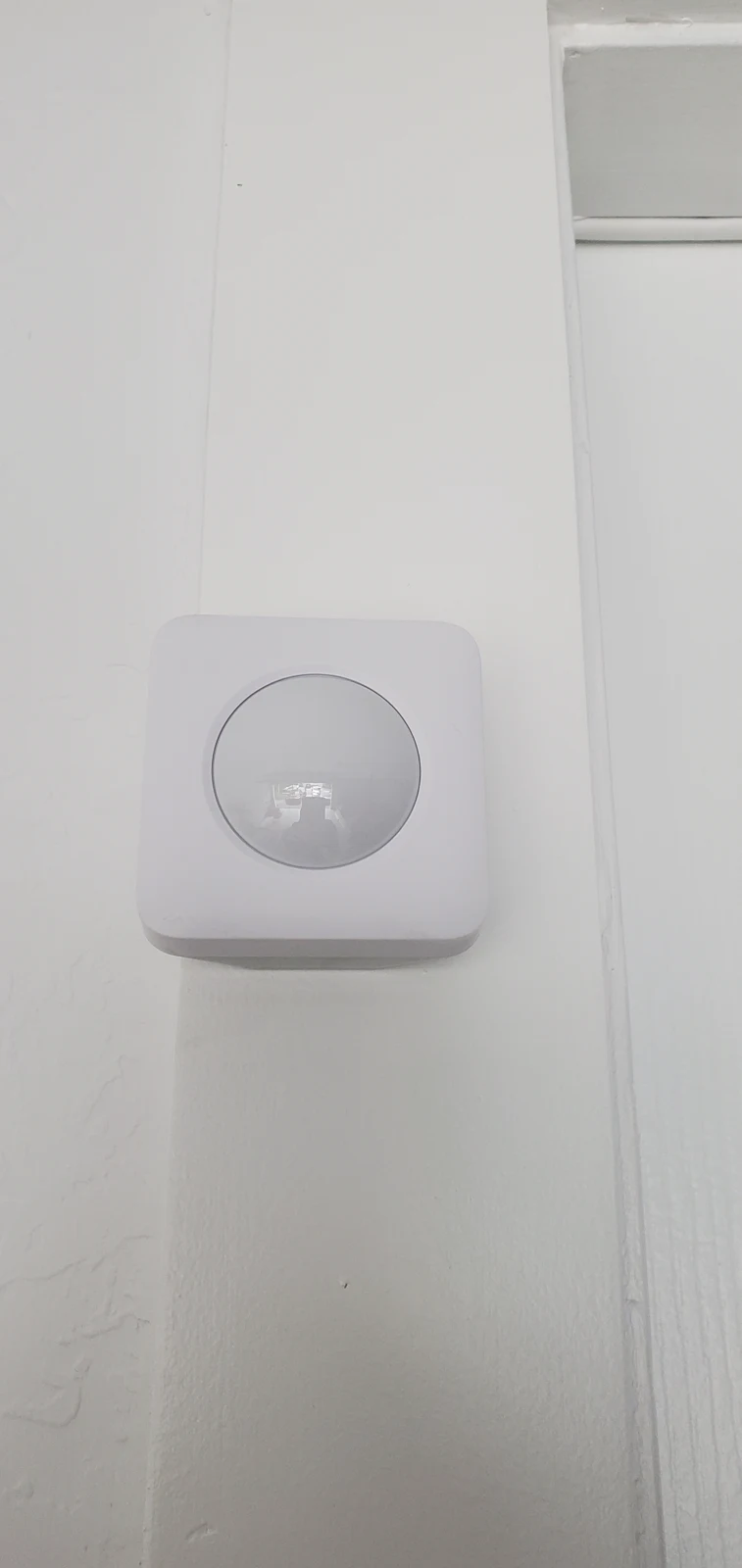 Indoor alarm detector mounted on a wall